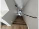 Stairway featuring modern decor and wood laminate flooring at 8072 Cimarron Ridge Dr # 201, Las Vegas, NV 89128