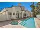 Inviting backyard featuring a pool and spa perfect for entertaining and relaxation at 8124 Bay Harbor Dr, Las Vegas, NV 89128
