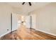 Bedroom with wood flooring and doors leading to other rooms at 8124 Bay Harbor Dr, Las Vegas, NV 89128