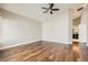 Bright, open bedroom with ceiling fan and wood floors at 8124 Bay Harbor Dr, Las Vegas, NV 89128