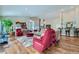 Bright living room featuring hardwood floors, comfortable seating, and an open floor plan at 8124 Bay Harbor Dr, Las Vegas, NV 89128