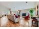 Spacious living room features fireplace, hardwood floors, and comfortable seating at 8124 Bay Harbor Dr, Las Vegas, NV 89128
