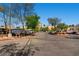 Outdoor parking lot with view of Restaurant Row sign and surrounding palm trees at 8124 Bay Harbor Dr, Las Vegas, NV 89128