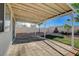Backyard showcases a covered patio, landscaping, and a spacious concrete area at 832 Seco Verde Ave, Henderson, NV 89015
