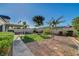 Enjoy the backyard, featuring a covered patio, xeriscaping, and walkway at 832 Seco Verde Ave, Henderson, NV 89015