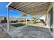 The backyard features a covered patio, lawn, and low-maintenance landscaping at 832 Seco Verde Ave, Henderson, NV 89015