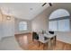 Cozy dining room with hardwood floors, vaulted ceiling, and natural light at 832 Seco Verde Ave, Henderson, NV 89015
