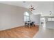 Bright dining room with vaulted ceilings and a modern light fixture at 832 Seco Verde Ave, Henderson, NV 89015