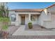 Charming front porch with a security door and desert landscaping at 832 Seco Verde Ave, Henderson, NV 89015