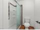 Bathroom with a glass-enclosed shower and toilet at 8337 Willow Basin Ct, Las Vegas, NV 89131