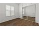 Bedroom with bright light, plantation shutters, and a mirrored closet at 8337 Willow Basin Ct, Las Vegas, NV 89131