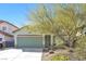 Charming single-story home featuring a well-kept yard and a two-car garage with mature landscaping at 8337 Willow Basin Ct, Las Vegas, NV 89131