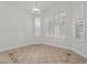 Inviting living room featuring tile flooring, neutral paint, shuttered windows, and ample natural light at 8337 Willow Basin Ct, Las Vegas, NV 89131