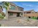 Spacious backyard with pavers, gravel, and artificial turf, perfect for entertaining at 8801 Trotternish Ridge Dr, Las Vegas, NV 89166