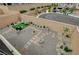 A backyard oasis with gravel, stone pavers, manicured plants, and seating areas, surrounded by block wall at 8801 Trotternish Ridge Dr, Las Vegas, NV 89166