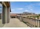 Comfortable balcony with iron railing offering neighborhood views and relaxing outdoor space at 8801 Trotternish Ridge Dr, Las Vegas, NV 89166