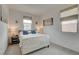 Cozy bedroom features plush carpet, roller shades, and ample natural light at 8801 Trotternish Ridge Dr, Las Vegas, NV 89166