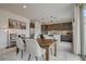 Elegant dining area with modern lighting fixtures and an inviting ambiance, ideal for gatherings at 8801 Trotternish Ridge Dr, Las Vegas, NV 89166