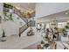 Spacious entryway boasting a dramatic staircase, stylish decor, and an abundance of natural light at 8801 Trotternish Ridge Dr, Las Vegas, NV 89166
