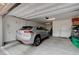 Organized garage with SUV parked inside and ample storage space at 8801 Trotternish Ridge Dr, Las Vegas, NV 89166