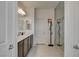 Modern main bathroom with double vanity, glass shower, and stylish fixtures at 8801 Trotternish Ridge Dr, Las Vegas, NV 89166