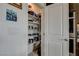 Walk-in pantry with lots of shelves for storage at 8801 Trotternish Ridge Dr, Las Vegas, NV 89166