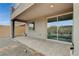 Paver patio with a view of the landscaped backyard. This patio extends the indoor living space outdoors at 8801 Trotternish Ridge Dr, Las Vegas, NV 89166