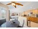 Eat-in kitchen showcases modern table and bright natural light at 9404 Low Tide Ct, Las Vegas, NV 89117