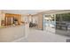 Bright kitchen with stainless steel appliances and breakfast bar seating at 9404 Low Tide Ct, Las Vegas, NV 89117