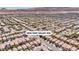 Residential neighborhood aerial shot shows mountain views, well-maintained homes, and access to community features at 9541 Vast Valley Ave, Las Vegas, NV 89148