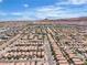 Overhead neighborhood shows well-maintained homes and tree-lined streets under a bright, clear sky at 9541 Vast Valley Ave, Las Vegas, NV 89148