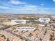 Overhead capture of a suburban development, noting the inclusion of a hospital, highway, and other amenities at 9541 Vast Valley Ave, Las Vegas, NV 89148