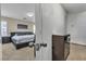 Partial view of bedroom featuring a bed and dresser at 9541 Vast Valley Ave, Las Vegas, NV 89148