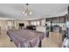 Spacious open plan living area with a kitchen, living room and game area at 9541 Vast Valley Ave, Las Vegas, NV 89148