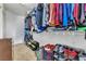 Organized walk-in closet with multiple shelves and rods at 9541 Vast Valley Ave, Las Vegas, NV 89148
