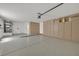 Spacious garage with epoxy floor, custom cabinets, and plenty of room for storage and vehicles at 9552 Gold Bank Dr, Las Vegas, NV 89134