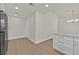 Another view of the kitchen with stainless appliances and wood floors at 9552 Gold Bank Dr, Las Vegas, NV 89134