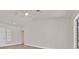Bright living room with a clean design, featuring a white door, and neutral walls at 9552 Gold Bank Dr, Las Vegas, NV 89134