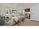 Bright living space with sliding glass doors leading to the outdoor space and backyard at 9552 Gold Bank Dr, Las Vegas, NV 89134