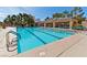 Community pool with lap lanes and ample seating in a meticulously landscaped environment at 9552 Gold Bank Dr, Las Vegas, NV 89134