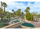 Charming community putting green with mature landscaping and scenic views at 9552 Gold Bank Dr, Las Vegas, NV 89134