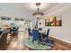 Cozy dining area adjacent to the kitchen featuring modern lighting and stylish decor at , Henderson, NV 89011