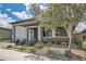 Charming single-story home featuring a two-car garage, covered porch, and mature landscaping at , Henderson, NV 89011