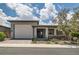 Charming single-story home featuring a two-car garage, covered porch, and well-maintained landscaping at , Henderson, NV 89011