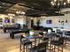 Spacious game room featuring pool tables, seating areas, and multiple wall-mounted tvs at , Henderson, NV 89011