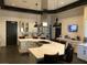 Bright kitchen features pendant lighting, stainless hood, gas cooktop, and white herringbone tile at , Henderson, NV 89011