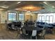 Large meeting room with multiple tables and chairs under tray ceilings with decorative lighting at , Henderson, NV 89011