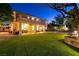 Large backyard with a covered patio, perfect for relaxing and enjoying the outdoors with artificial turf at , Las Vegas, NV 89131