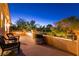 A spacious balcony with wrought iron railings, outdoor seating and views of the surrounding landscape at , Las Vegas, NV 89131