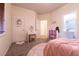 Bedroom featuring a window and nearby bathroom at , Las Vegas, NV 89131